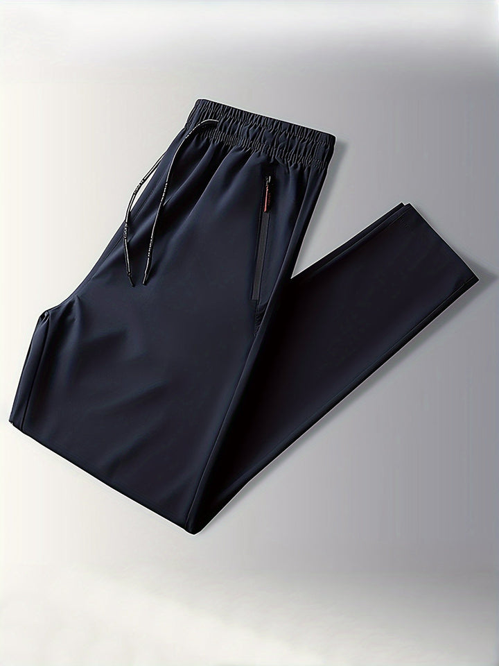 Solid-colored jogging pants with zipper details - Milan