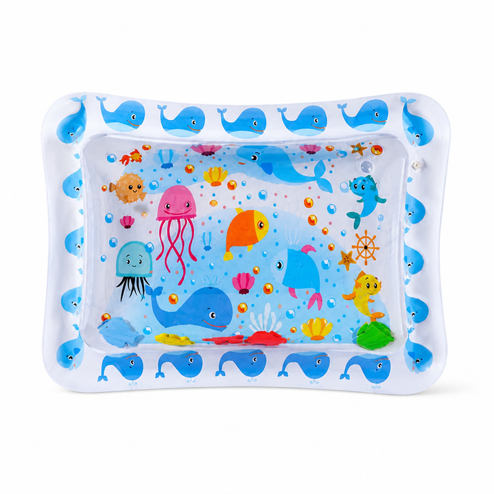 Rechteckige Wassermatte mit weißem Rand voller kleiner blauer Wale, innen Quallen, Fische und Muscheln sowie bunte Schwimmfiguren. 8