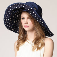 Light, sun-resistant women's beach hat with wide brim – Cleofa
