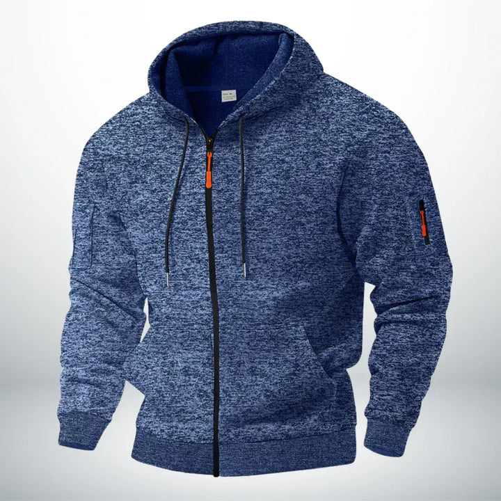 Kapuzenjacke in meliertem Blau, frontal von schräg gezeigt, mit Reißverschluss, Kordeln, orangefarbenem Zipper und Tasche am Ärmel. 1