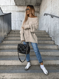 Loose knitted women's sweater with off-shoulder design – Amira