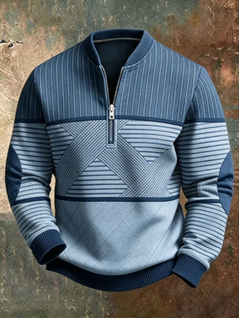 Pullover mit halbem Reißverschluss in Blautönen, mit Längs- und Querstreifen, Rautenmuster im unteren Teil und Ellbogenpatches in der Frontansicht. 3