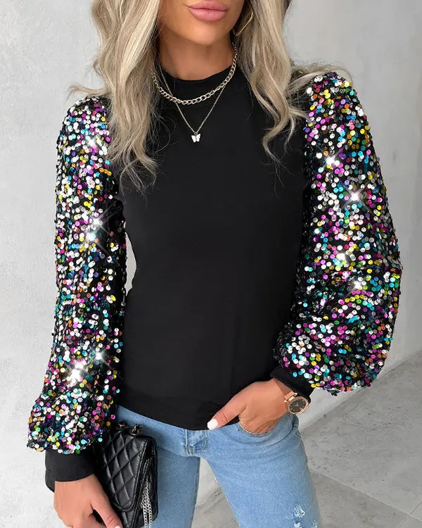 Trendy damebluse med farvede ballonærmer - Lorena