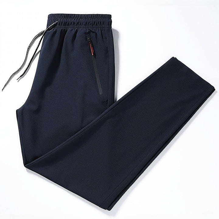 Solid-colored jogging pants with zipper details - Milan