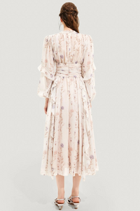 Summer dress with floral pattern and pleated skirt – Alina