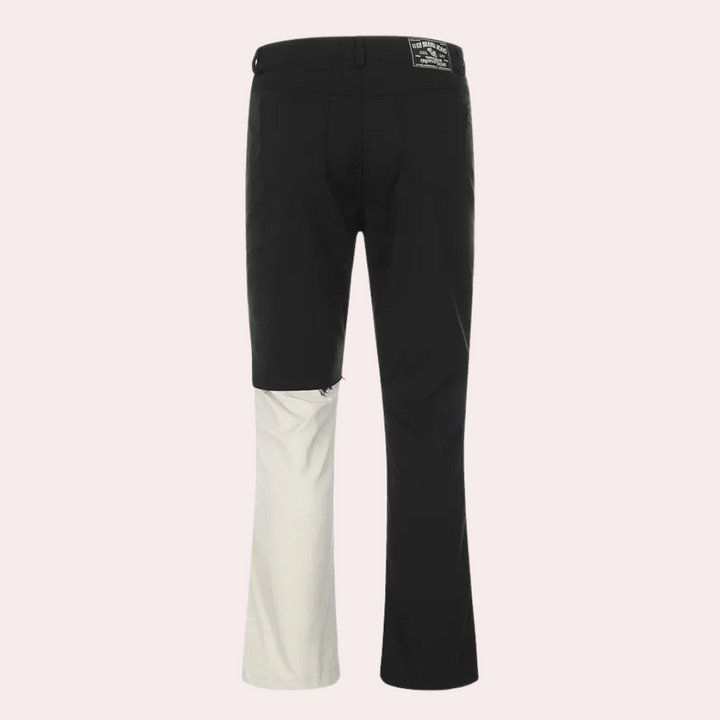 Schwarz-weiße Herren-Hose, zweifarbig, modisch, Baumwolle, Rückansicht, urbaner Stil.