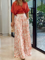 Zweiteiliges Sommeroutfit mit lockerer Bluse und weit geschnittene Hose – Élise