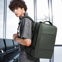 Udvidelig 26–45L vandtæt rejserygsæk med laptoprum og duffel-mulighed