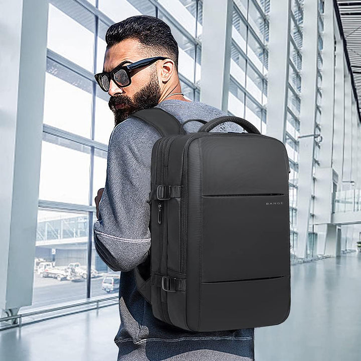 Udvidelig 26–45L vandtæt rejserygsæk med laptoprum og duffel-mulighed