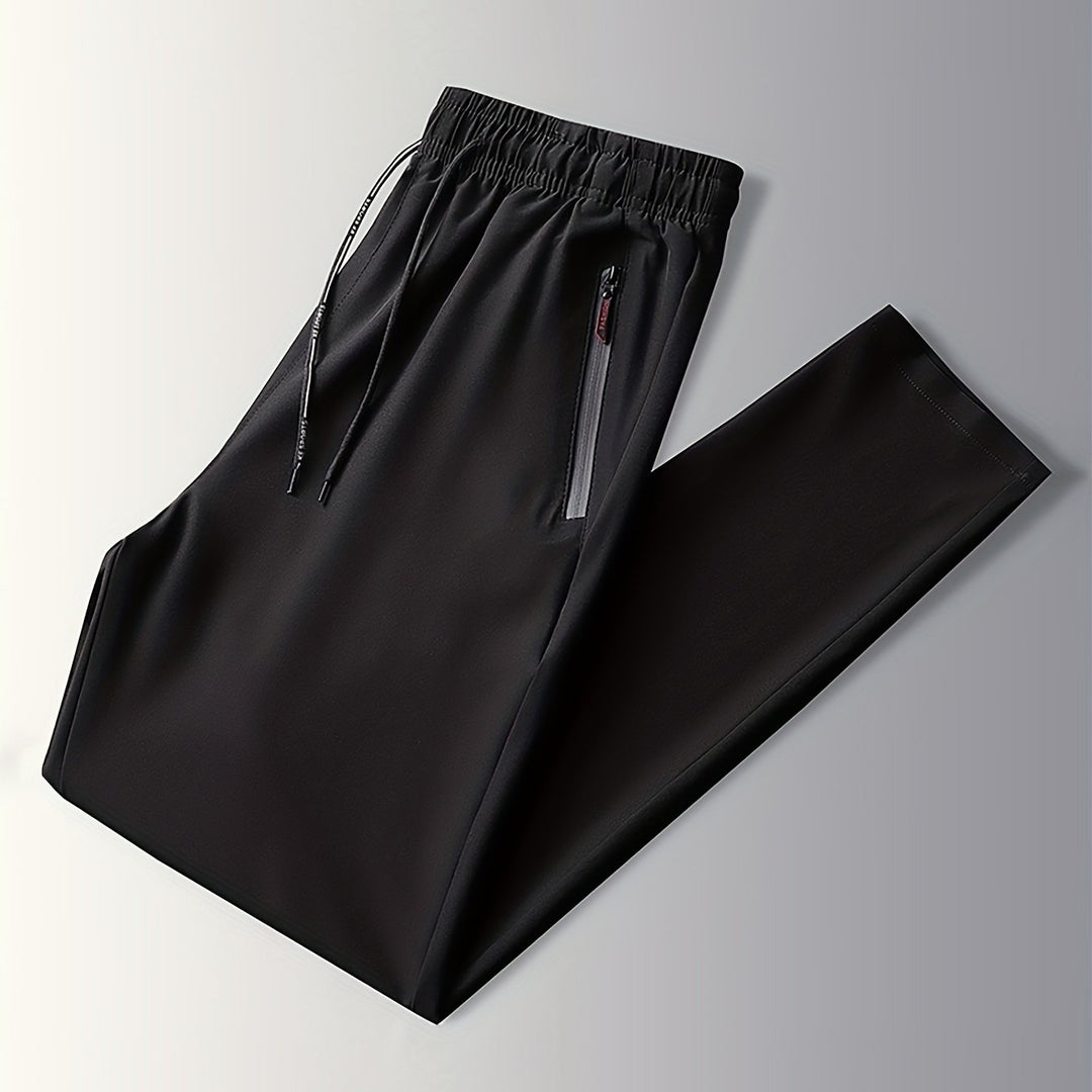 Solid-colored jogging pants with zipper details - Milan