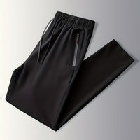 Solid-colored jogging pants with zipper details - Milan