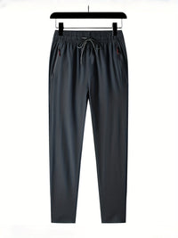Solid-colored jogging pants with zipper details - Milan