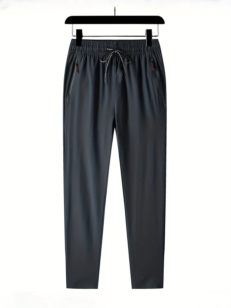 Solid-colored jogging pants with zipper details - Milan