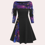 Lila-schwarzes Damenkleid mit Sternenmuster, Knöpfen, schulterfreiem Design, langärmelig.