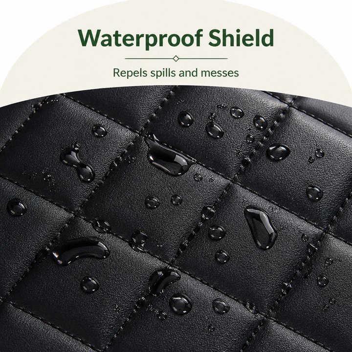 Nahaufnahme der schwarzen Steppoberfläche mit Wassertropfen, die auf dem glatten Material abperlen und die wasserabweisende Wirkung zeigen. 3