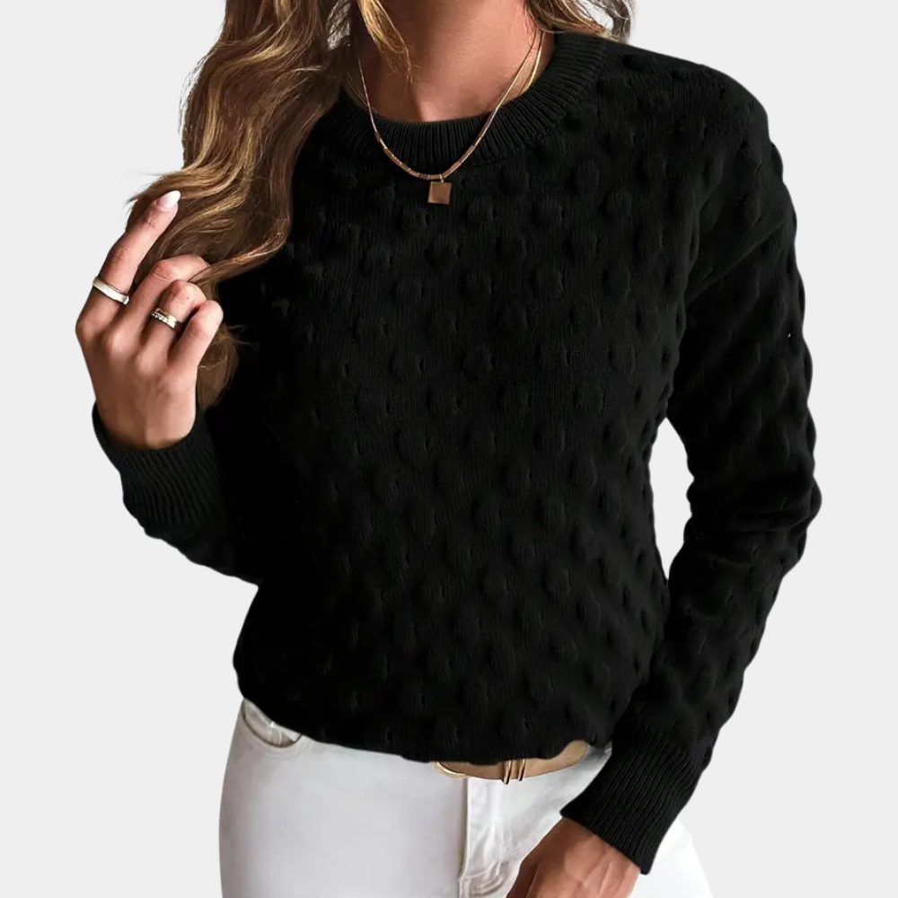 Schwarzer Damenpullover mit Punktmuster, langärmelig, Strick, modisch, elegant, Herbstmode.