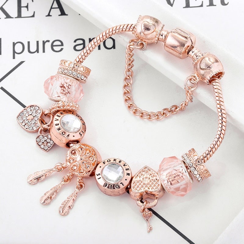 Pulsera atrapasueños rosa con charms de plata de ley