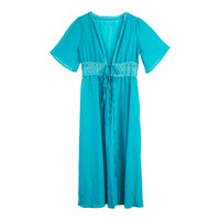 Long beach dress with lace accents and bow closure – Elara