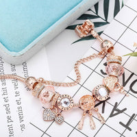 Pulsera atrapasueños rosa con charms de plata de ley