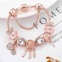 Pulsera atrapasueños rosa con charms de plata de ley
