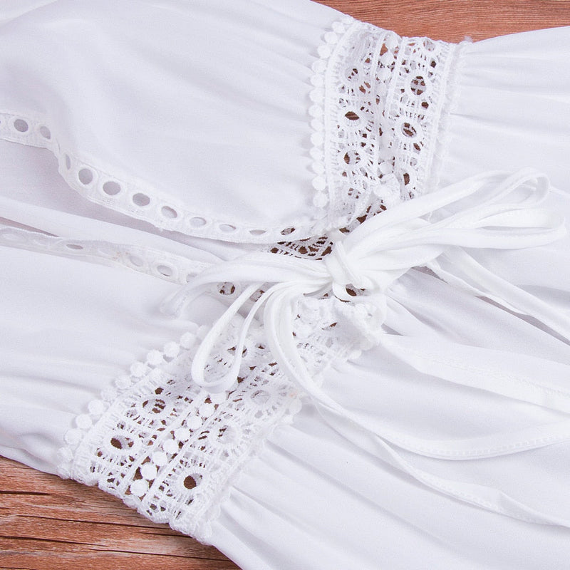 Long beach dress with lace accents and bow closure – Elara