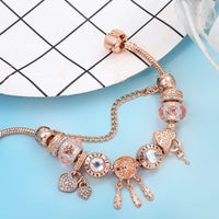 Pulsera atrapasueños rosa con charms de plata de ley