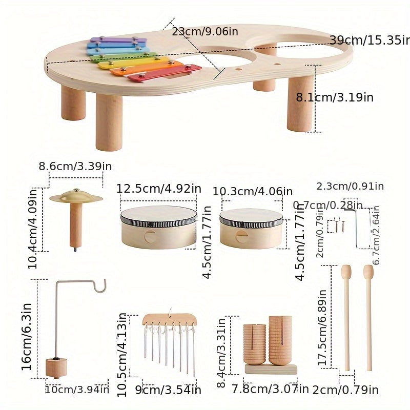 Übersichtsbild aller Einzelteile des Sets mit Maßangaben: Tischplatte mit Beinen, Becken, zwei Trommeln, Klangstäbe, Rillenhölzer, Schlägel und Schrauben. 3