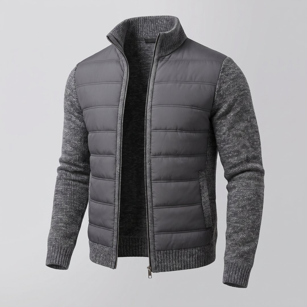 Dunkelgraue Steppjacke mit melierten Strickärmeln und schwarzem Innenfutter, schräg von vorn bei offenem Reißverschluss 2