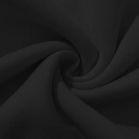 Schwarzer Baumwollstoff, Nahaufnahme, weiche Textur, ideal für Bekleidung und Heimtextilien.