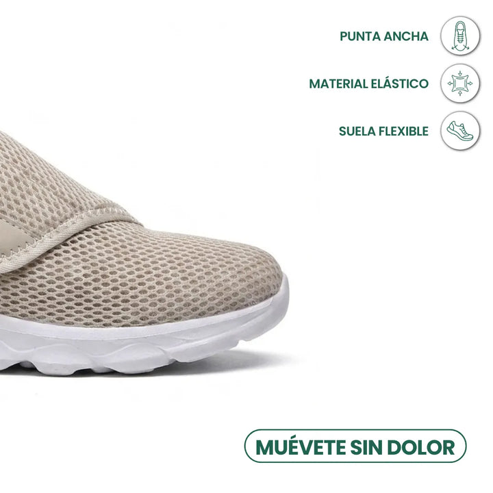 Vorderer Teil des beigen Mesh-Schuhs mit weißer Sohle, Symbole nennen breite Spitze, elastisches Material und flexible Sohle. 32