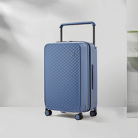 Hard-shell suitcase with wide handle – Oslo Metropolitan