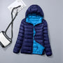 Wendbare Daunenjacke mit Kapuze – Soraya