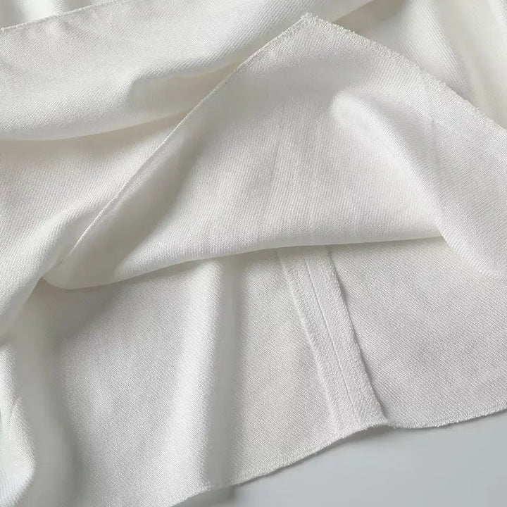 Weiße luftige & stylische ärmellose Leinenbluse für Damen – Amira