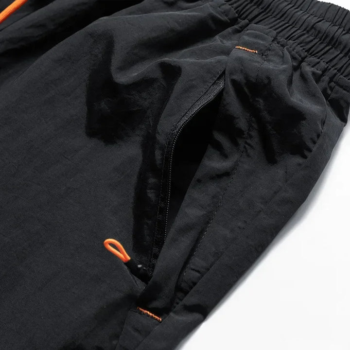 Pantalones cortos de running para hombre con pantalones interiores de malla y bolsillos con cremallera – Nikoas