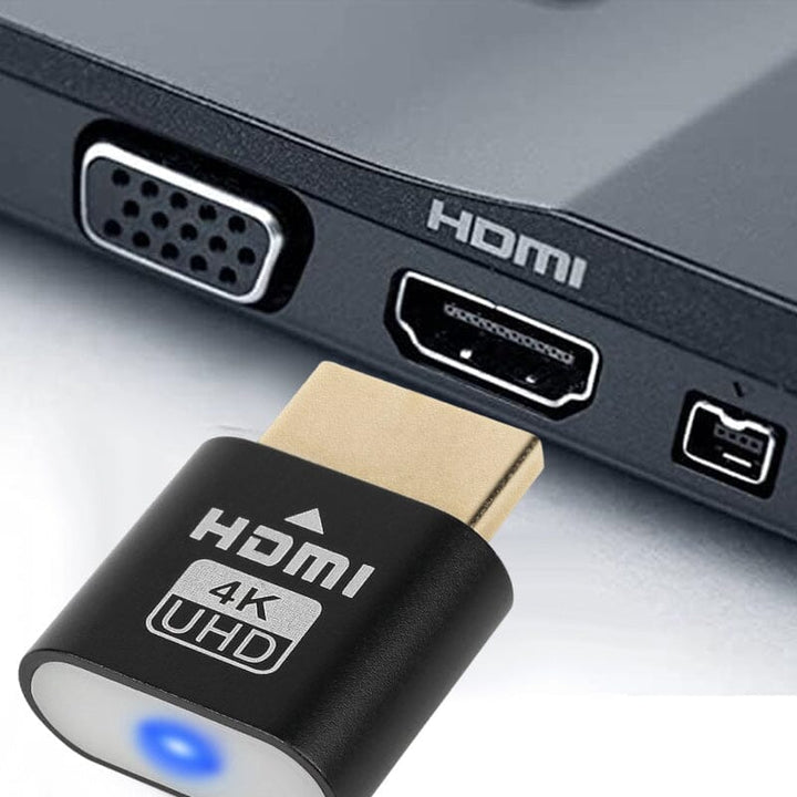 Schwarzer Stecker mit goldenem Anschluss, der vor die HDMI-Buchse eines Geräts gehalten wird, daneben ein VGA-Anschluss. 3