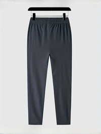 Solid-colored jogging pants with zipper details - Milan
