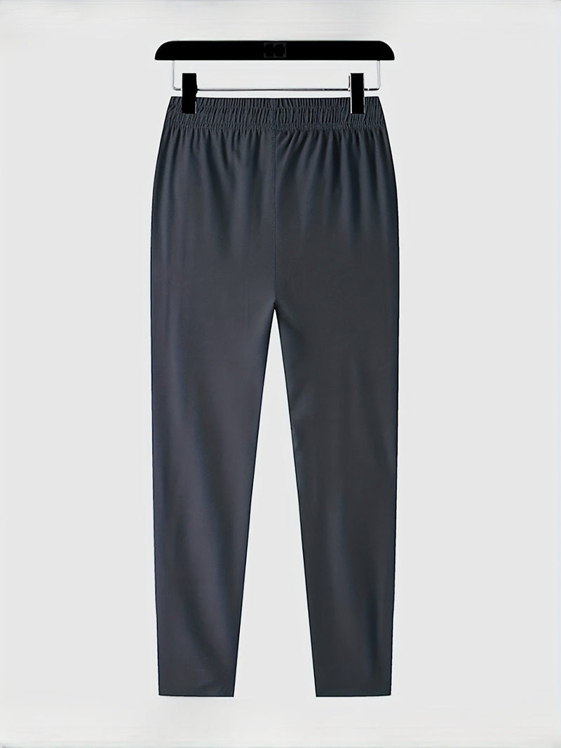 Solid-colored jogging pants with zipper details - Milan