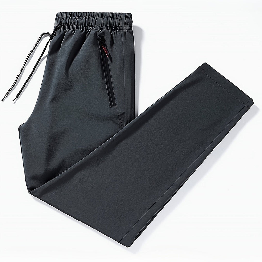 Solid-colored jogging pants with zipper details - Milan