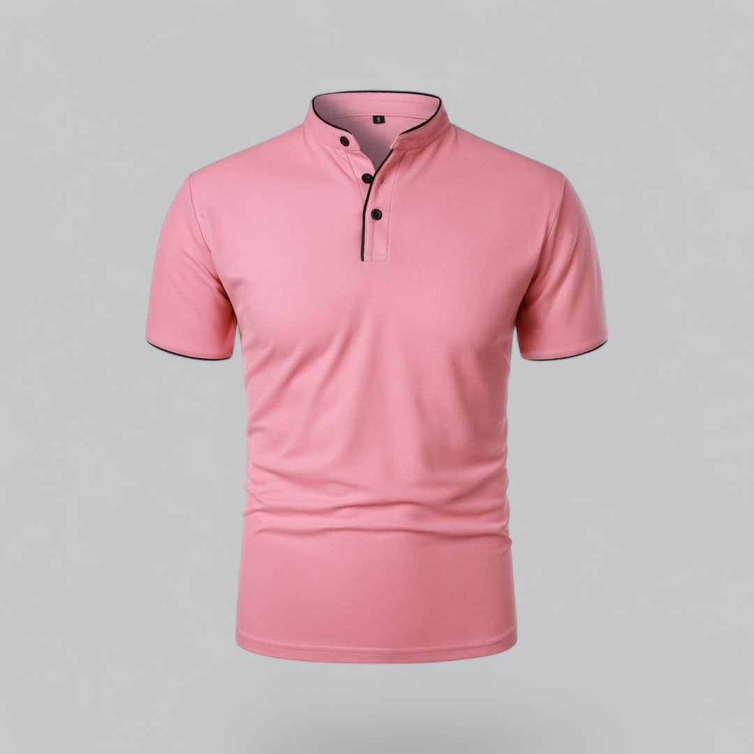 Vorderansicht in Rosa mit Stehkragen, schwarzen Knöpfen und schwarzer Paspel an Kragen und Ärmeln 7