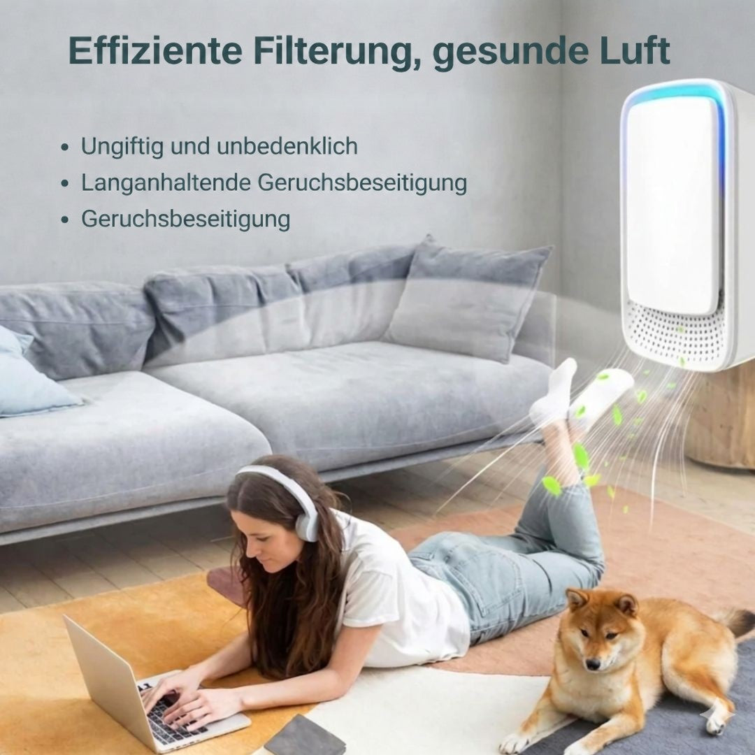 Frau mit Kopfhörern liegt am Laptop im Wohnzimmer, neben ihr ein Shiba Inu, vom Gerät strömt frische Luft 7