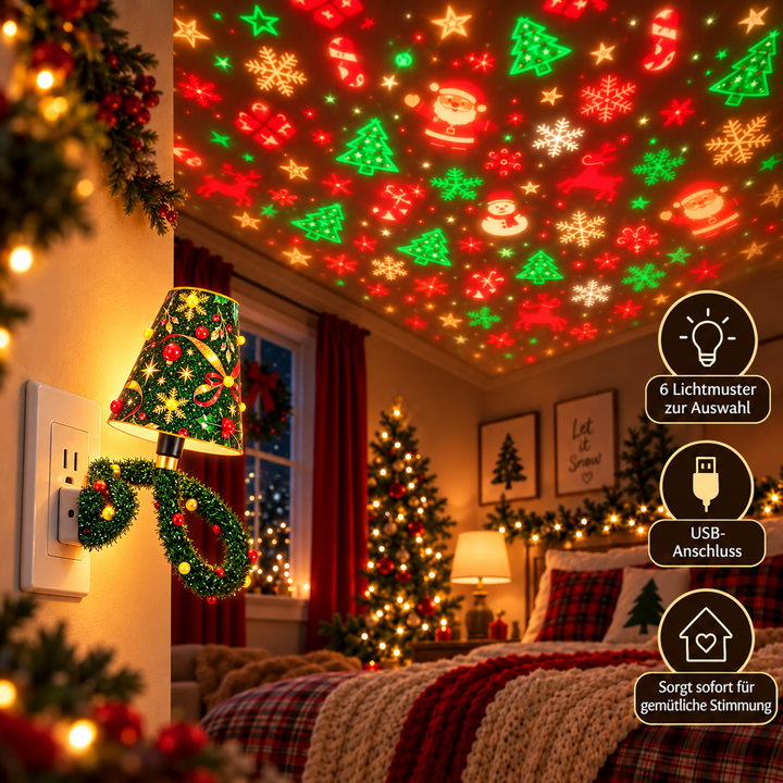 An der Wandsteckdose eingesteckte Lampe in einem Schlafzimmer, die bunte Weihnachtsmotive wie Weihnachtsmänner, Tannen und Rentiere an die Decke wirft. 6