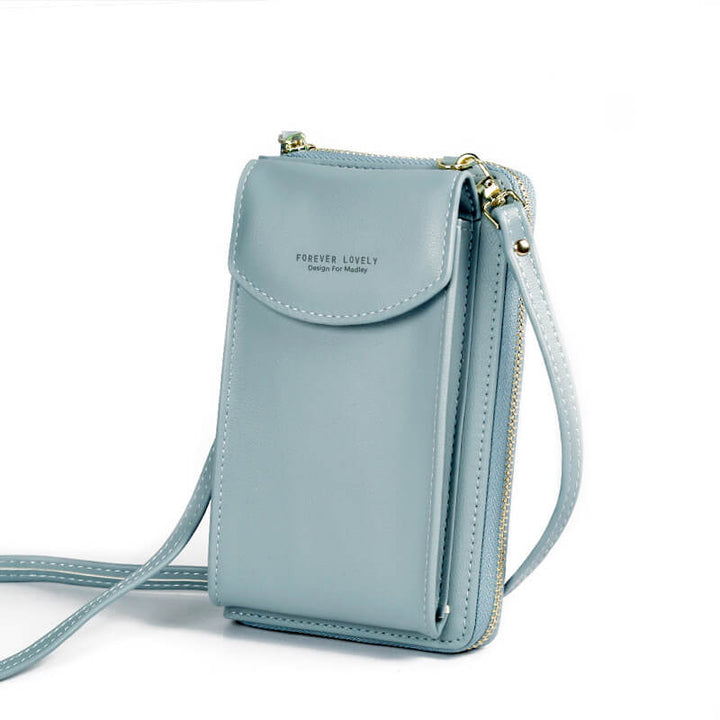 Compact shoulder bag made of PU leather with adjustable strap