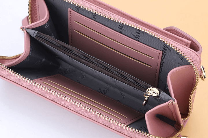 Compact shoulder bag made of PU leather with adjustable strap