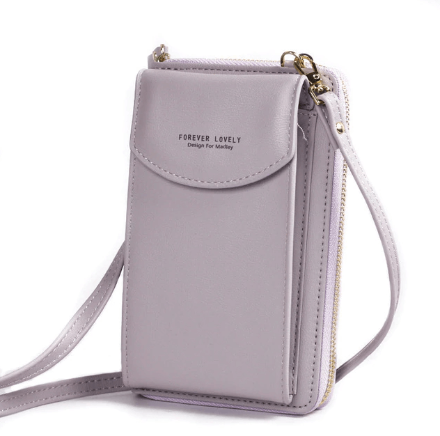 Compact shoulder bag made of PU leather with adjustable strap