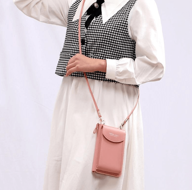 Compact shoulder bag made of PU leather with adjustable strap