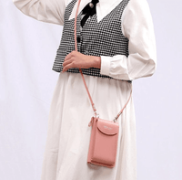 Compact shoulder bag made of PU leather with adjustable strap