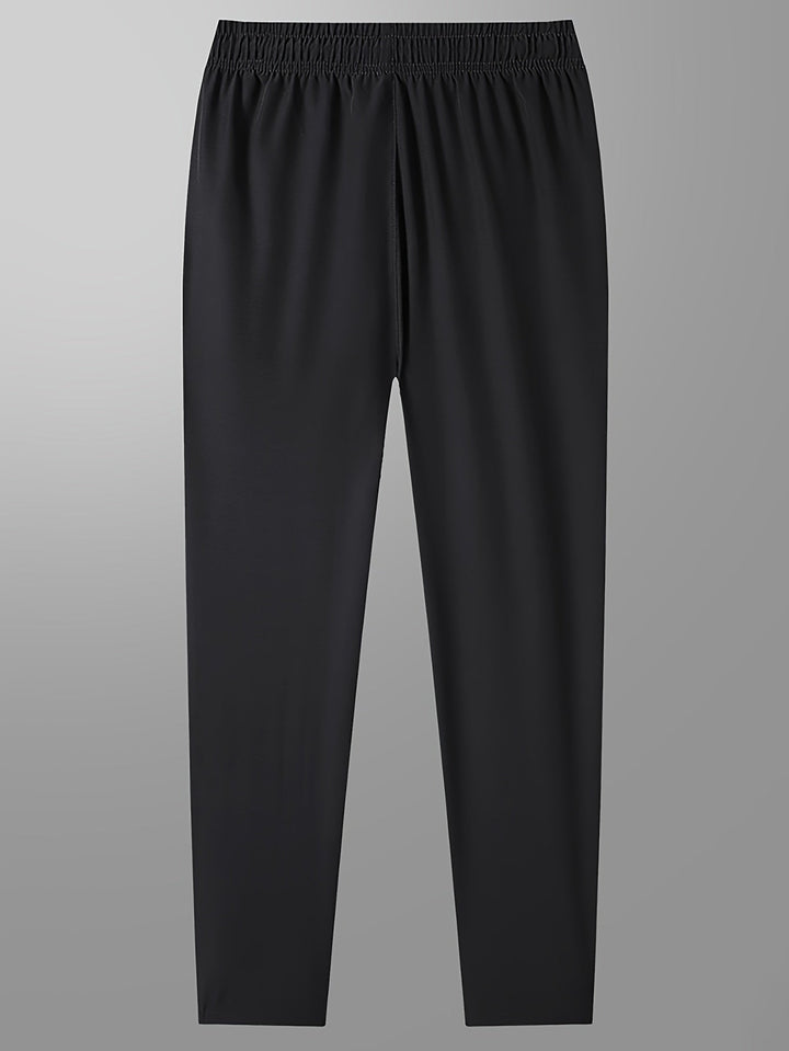Solid-colored jogging pants with zipper details - Milan