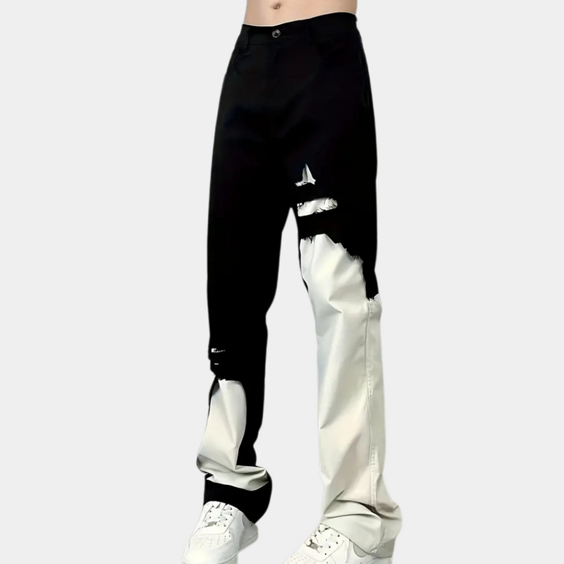 Schwarz-weiße zweifarbige Jeans mit Rissen, Unisex-Design, modische Streetwear-Hose.