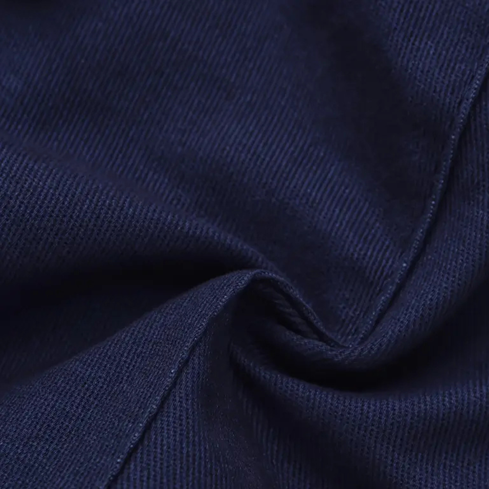 Dunkelblauer Baumwollstoff, Nahaufnahme, Textur, hochwertiges Material, Mode, Bekleidung.