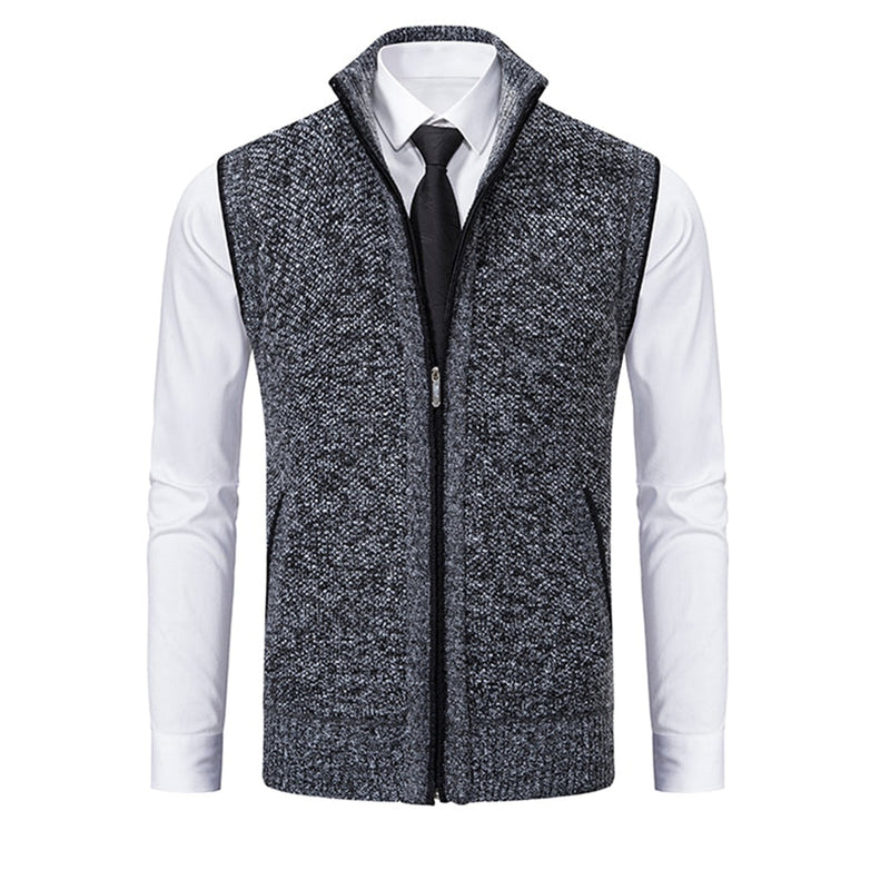 Dunkelgraue Strickweste mit Reißverschluss, Herrenmode, eleganter Stil, über Hemd und Krawatte.